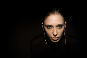 Portrait of a young seductive brunette