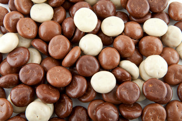 background of chocolate gingernuts, pepernoten in closeup