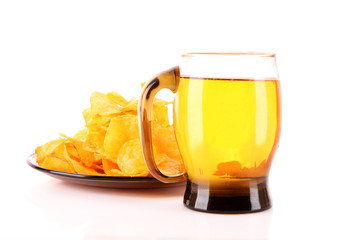 Potato chips in plate with cup of beer isolated on white