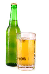 Bottle of beer and cup isolated on white