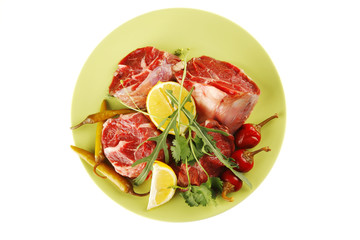 raw meat chunk on green plate