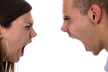 Young couple yelling at each other isolated on white