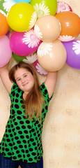 Fototapeta na wymiar girl hands up balloons