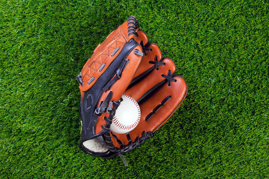 Baseball Glove And Ball On Grass