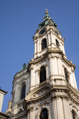 Fototapeta na wymiar st. nicholas church in prague - baroque tower