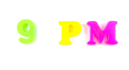 9 pm written in fridge magnets