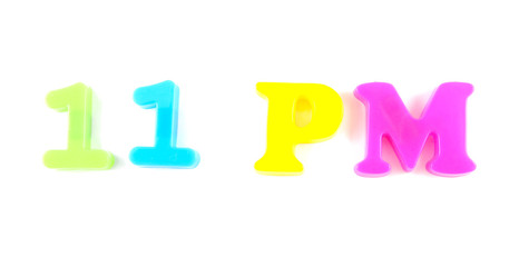 11 pm written in fridge magnets