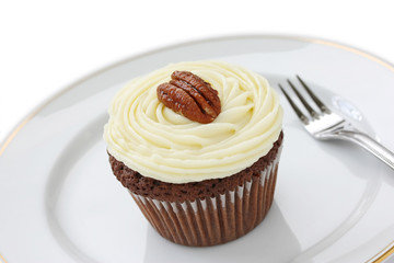 chocolate cupcake with pecan nuts