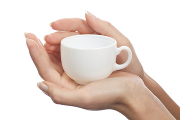 Coffee cup in female hands