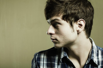 Fashion portrait of the young beautiful man