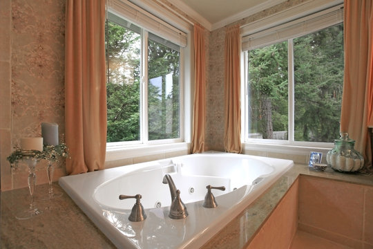 Bathroom, tub with two windows
