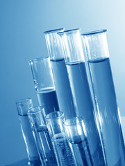 Test tubes on blue background