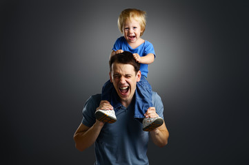 The portrait of a little boy and his father