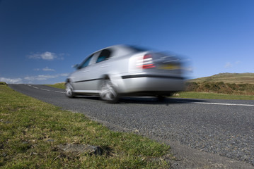 Fototapeta premium Blurred silver car