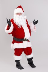 Full size portrait of surprised Santa Claus