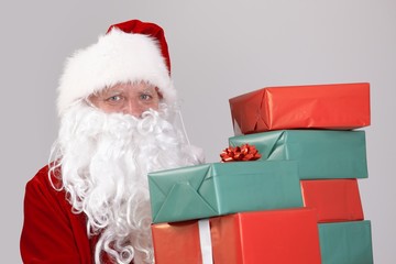 Santa holding christmas presents