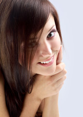 Fototapeta premium Portrait of young adult woman with health skin of face