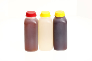 Assorted bottles with fresh juice