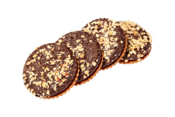 Chocolate biscuits sprinkled with nuts