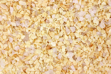 Very close view of garlic flakes with sea salt © Bert Folsom