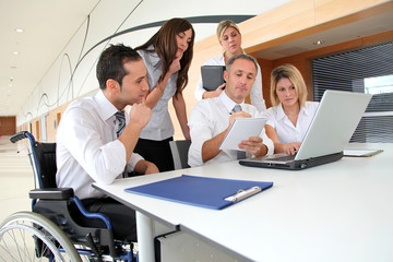 Group of office workers in a business meeting