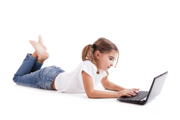 Little student girl with a laptop