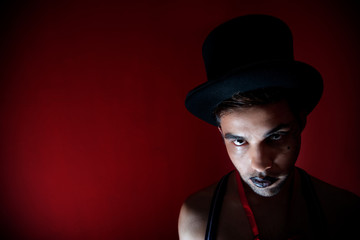 Eerie man in top hat