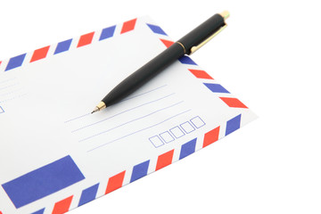 closeup of isolated air mail envelope with pen