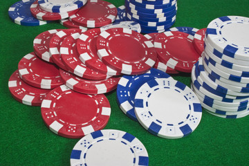 red, blue and white poker chips