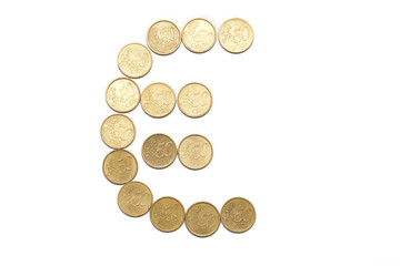 Euro symbol made with euro coins isolated on white