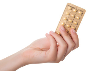 tablets (Birth Control Pills) in the hand
