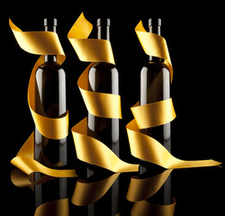 Wine bottles with gold ribbon