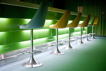 Chairs in row with green lights - 28002498