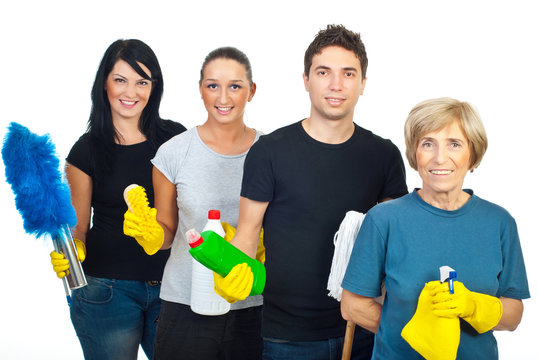 Cheerful team of cleaning people