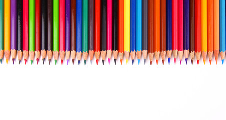 Obraz premium Assortment of coloured pencils with shadow