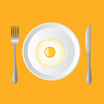 fried egg on white plate, knife, fork