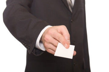 Businessman handing a blank business card over white