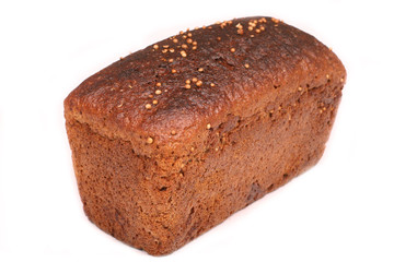 Loaf of brown fresh-baked bread