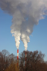 Smoke from the pipes.