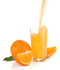 flowing juice and orange isolated on white