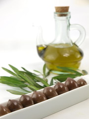 Fresh olives and olive oil