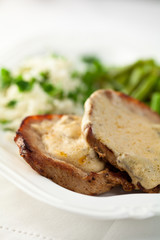 Roast pork with mushroom sauce and french beans
