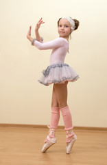 Little girl at the ballet class