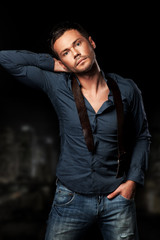 Fototapeta premium Young attractive man in urban