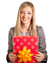 Blond caucasian woman in formal dress with gift boxes isolated