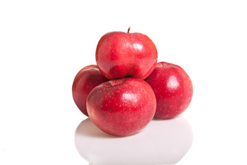Fresh red juicy natural apples on white isolated background