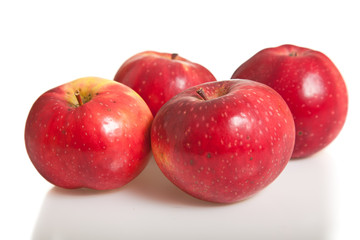 Fresh red juicy natural apples on white isolated background