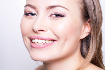 Obraz premium Attractive happy young woman portrait on white background