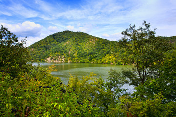 Fototapeta na wymiar Landscape with lake and mountains