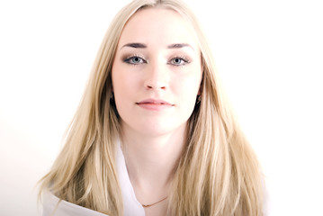 Portrait of a young blonde over white